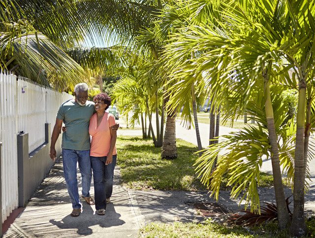 seniors walking together in residential district in Florida